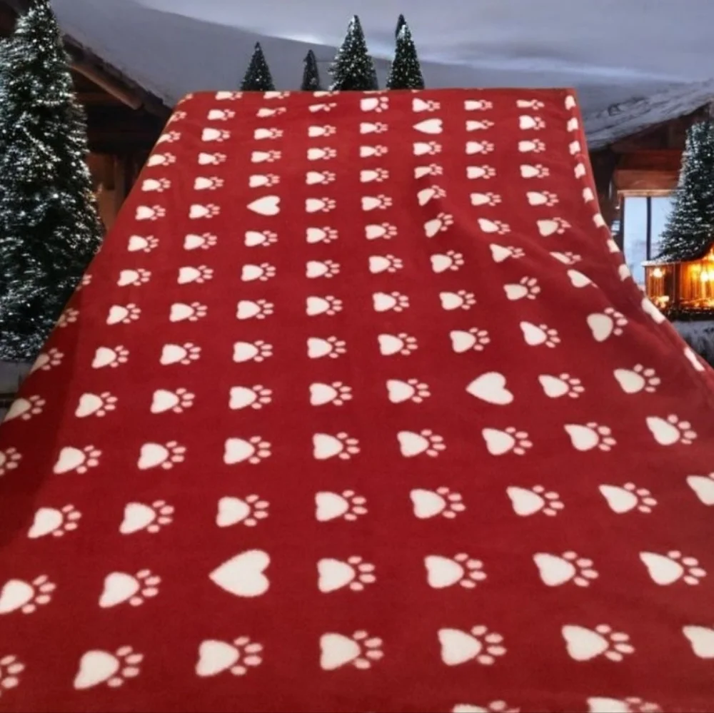 Doggie blanket a red & white with prints on it soft & cozy. 77”x50” clea…